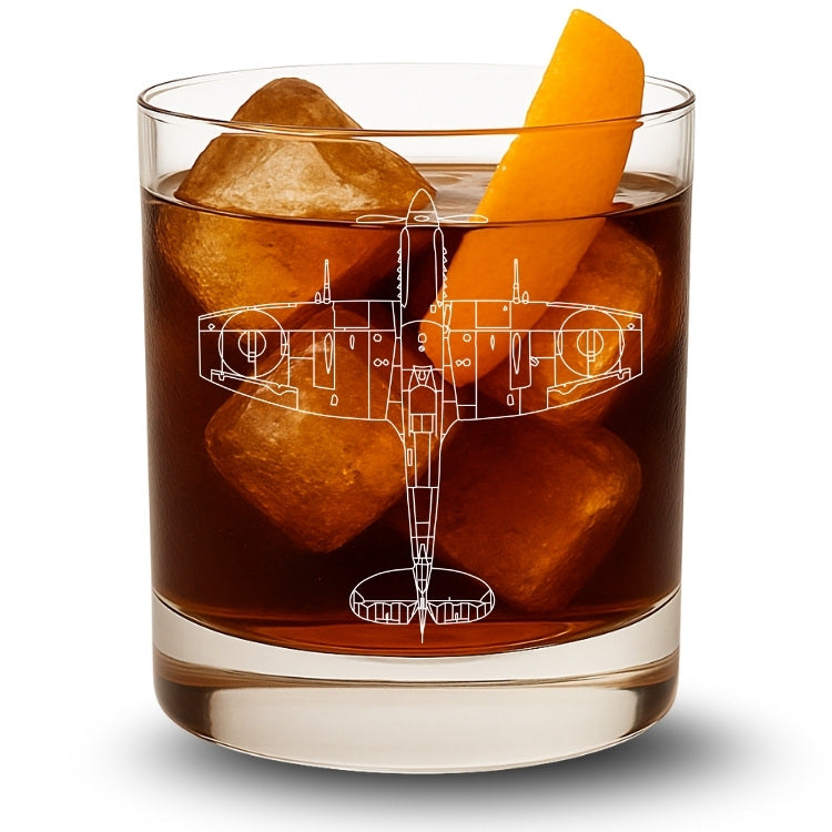 Glass of dark liquid with ice and an orange slice, featuring a clipped wing spitfire 14