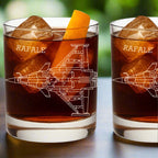 Two glasses with 'RAFALE' aircraft design and ice cubes