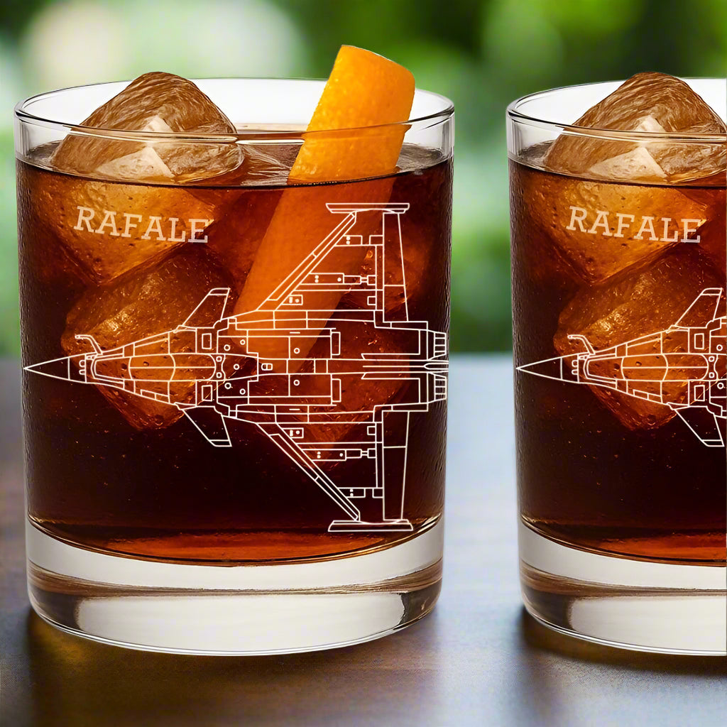 Two glasses with 'RAFALE' aircraft design and ice cubes