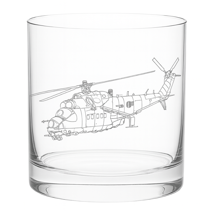 Clear glass tumbler with a helicopter etched on it against a white background