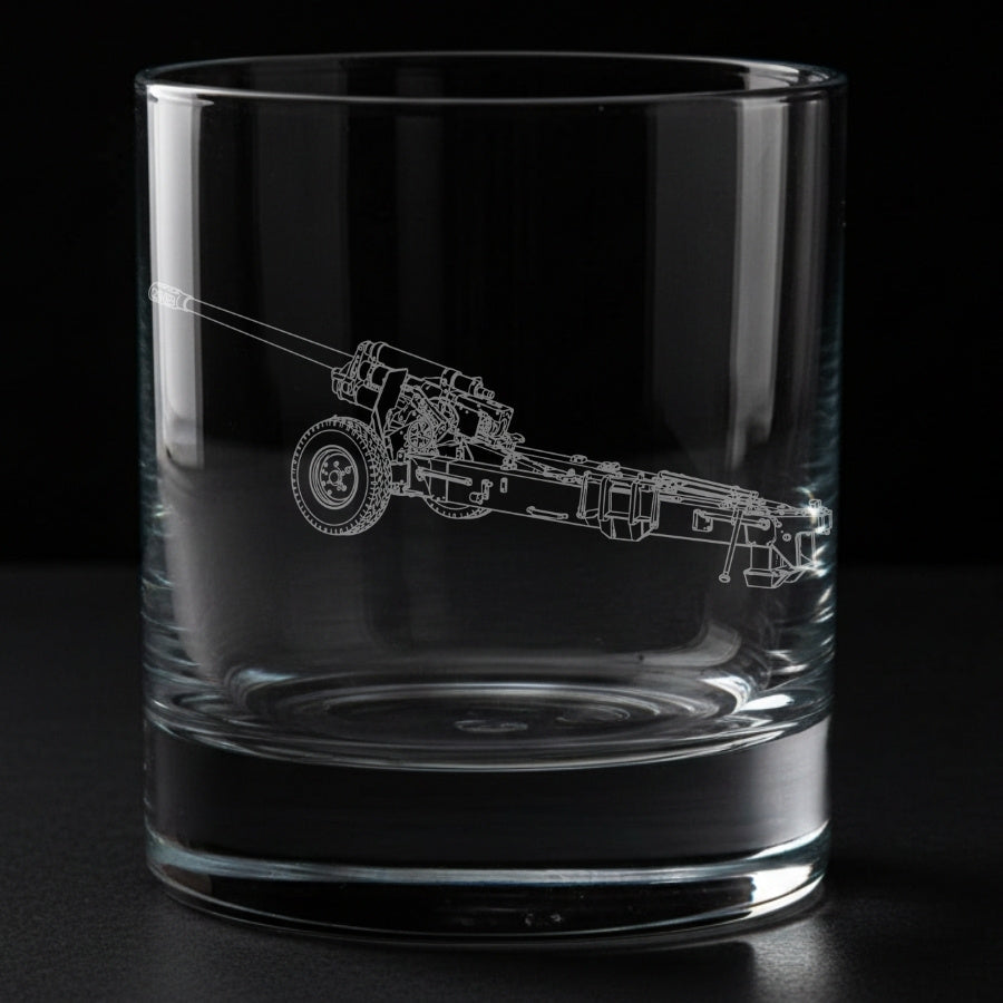 Clear glass tumbler with engraved M-46 130mm Field Gun, on a black background