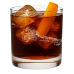 Glass of iced drink with an orange slice and ice cubes, featuring the M-46 130mm Field Gun, etched in glass.