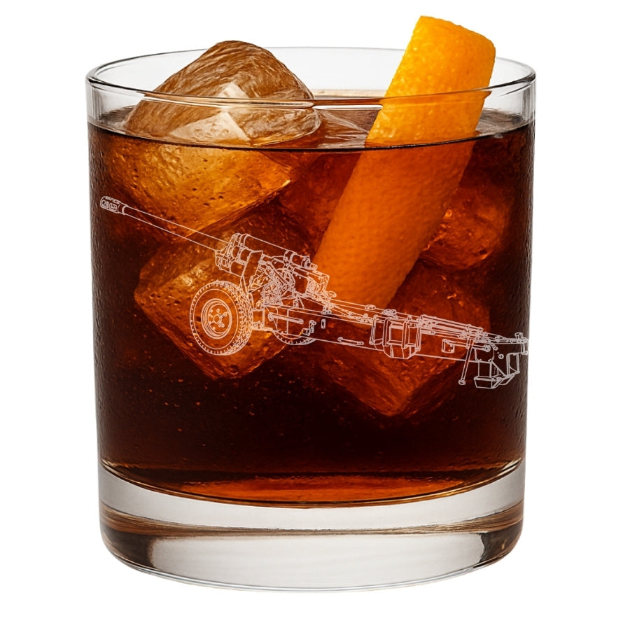 Glass of iced drink with an orange slice and ice cubes, featuring the M-46 130mm Field Gun, etched in glass.