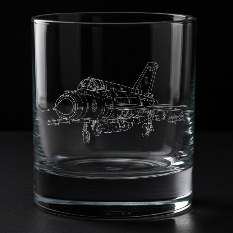 Clear glass tumbler with a Mig-21 plane engraving on a black background