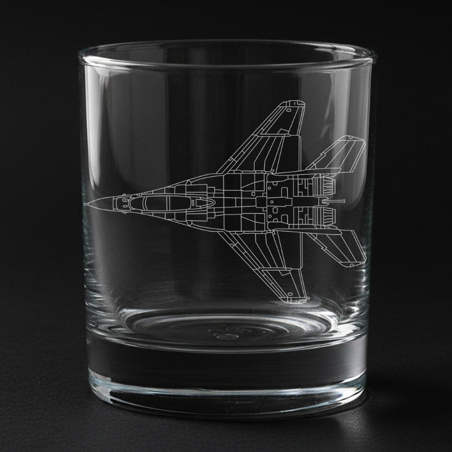 Clear glass tumbler with a Mig-29 fighter airplane etching on a black background
