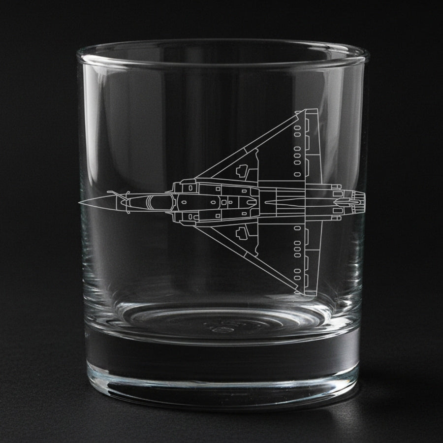 Clear glass tumbler with a Mirage 2000 aircraft engraving on a black background