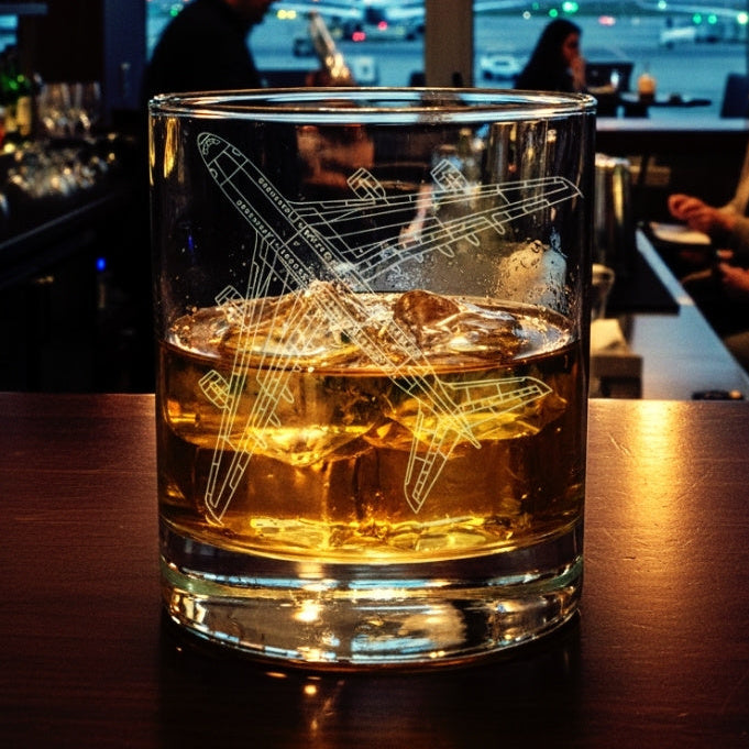 Glass with airbus A380 superjumbo airplane design ice cubes on a bar counter