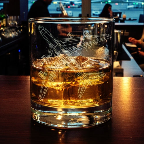 Glass with airbus A380 superjumbo airplane design ice cubes on a bar counter