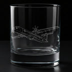 Clear glass tumbler with an atr-72 airplane engraving on a black background