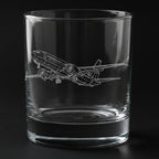 Clear glass tumbler with a boeing 737 airplane engraving on a black background