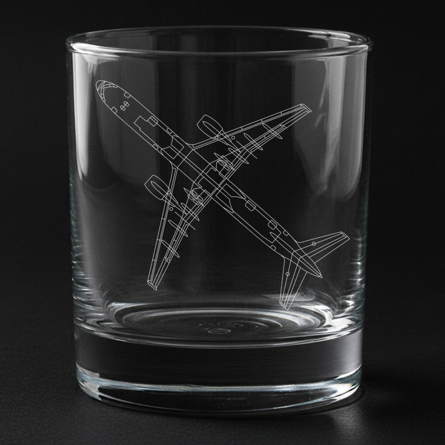 Clear glass tumbler with a boeing 757 airplane etching on a black background
