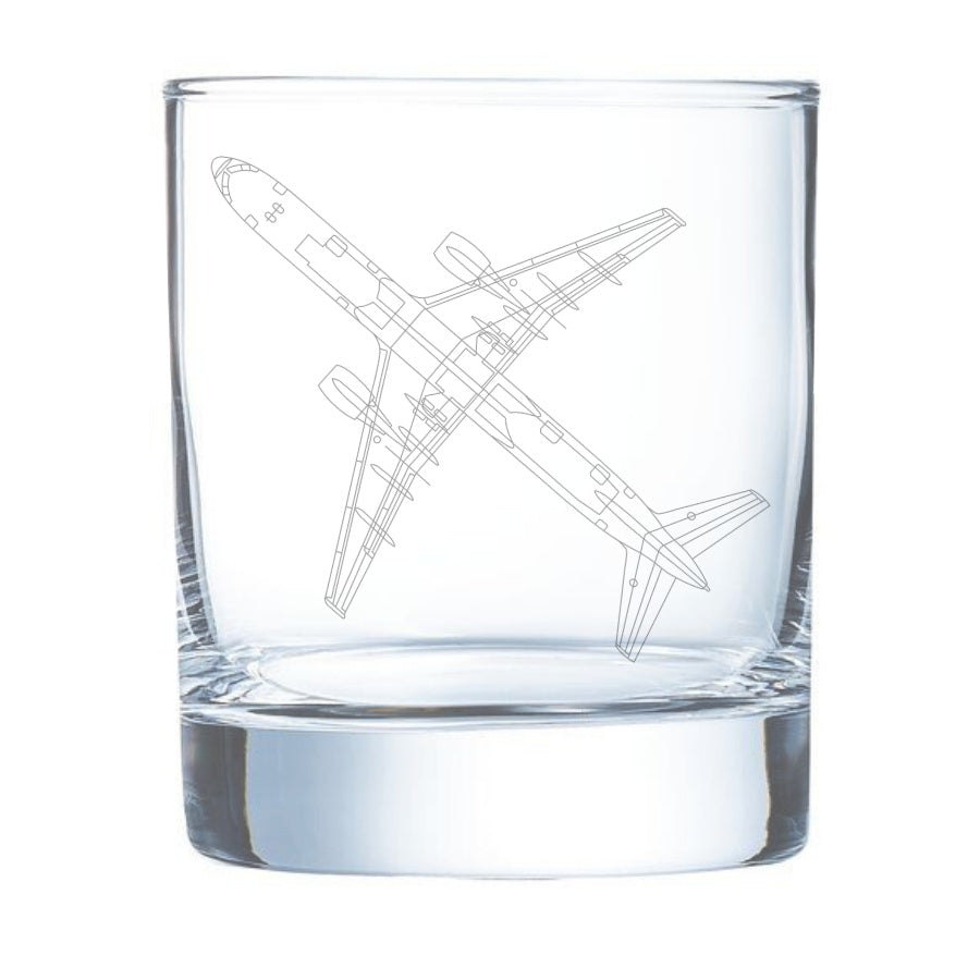 Clear glass tumbler with a boeing 757 airplane etching on a white background