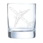 Clear glass tumbler with a boeing 757 airplane etching on a white background