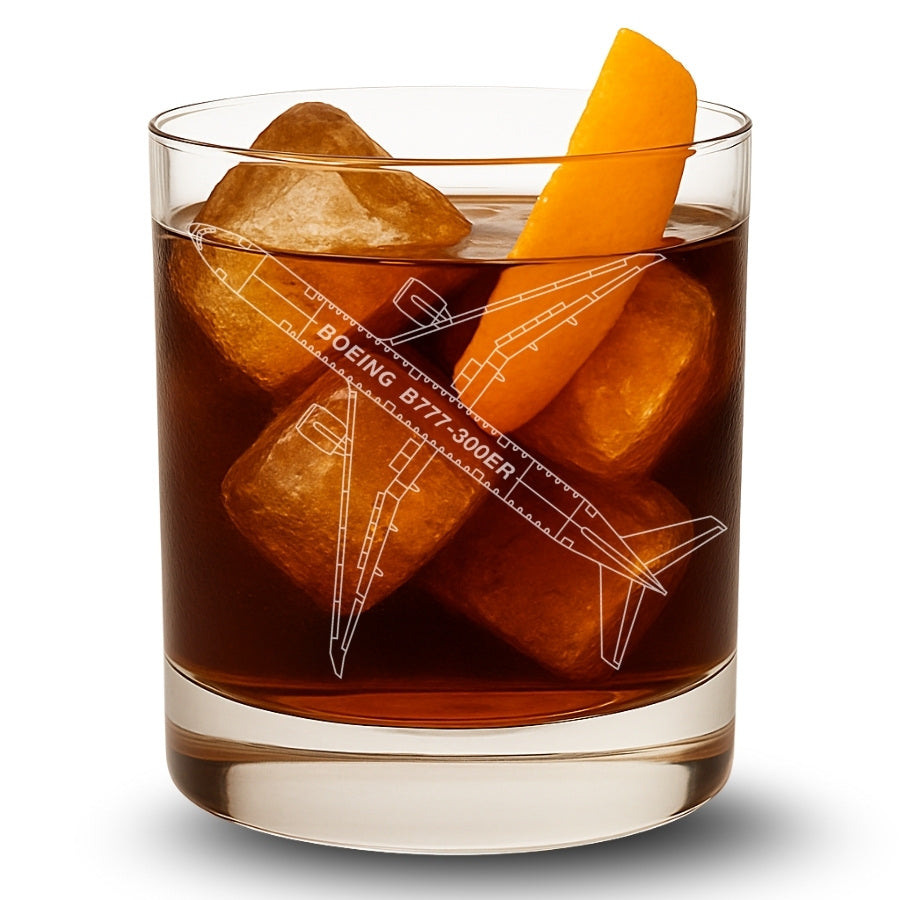 Glass of dark liquid with ice cubes and a boeing 777 design, on a white background