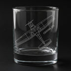 A cessna 172 aircraft engraved on a glass with a black background