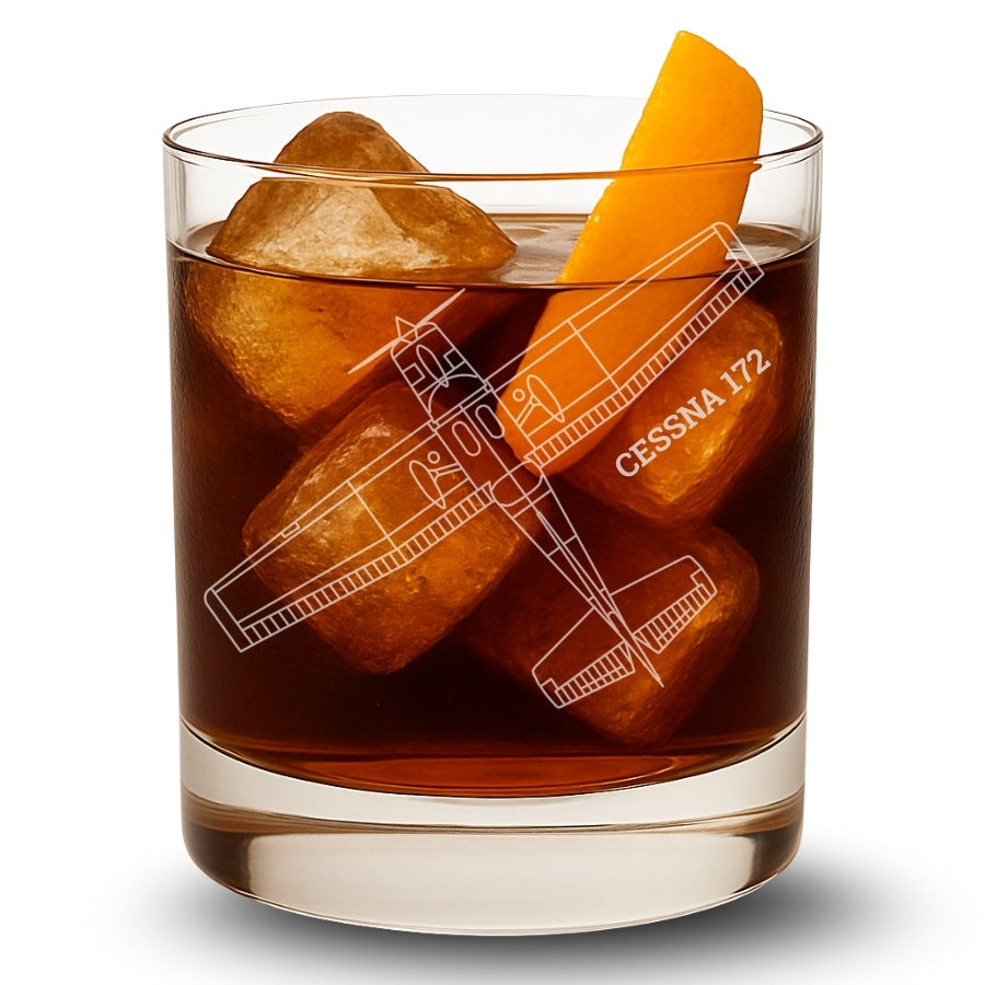 Glass of iced drink with Cessna 172 ice cubes on a white background