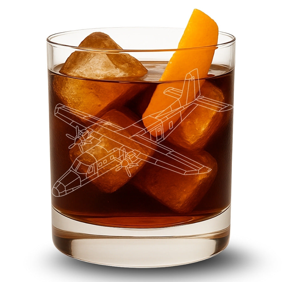 Glass of iced drink with donier 228 airplane ice cubes and an orange slice on a white background