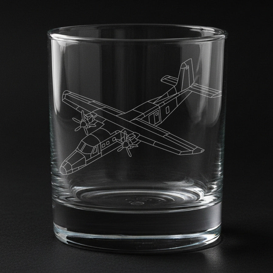 a dornier 228 aircraft etch on a glass with black background