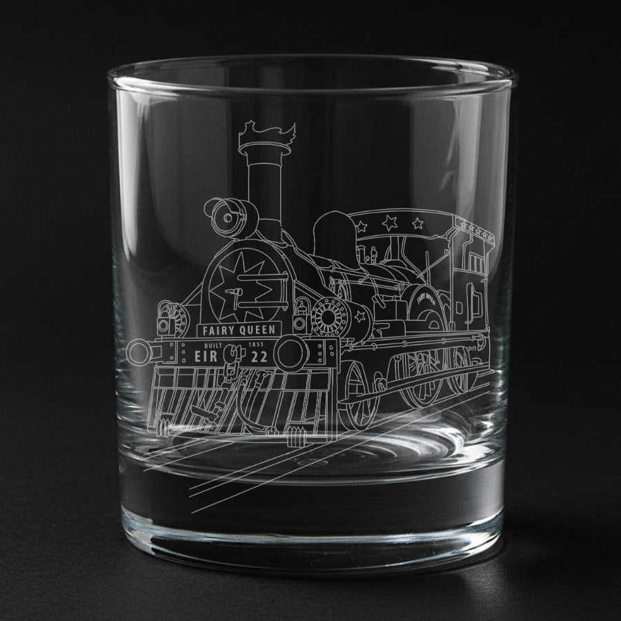 fairy queen locomotive engraved on a glass with a black background