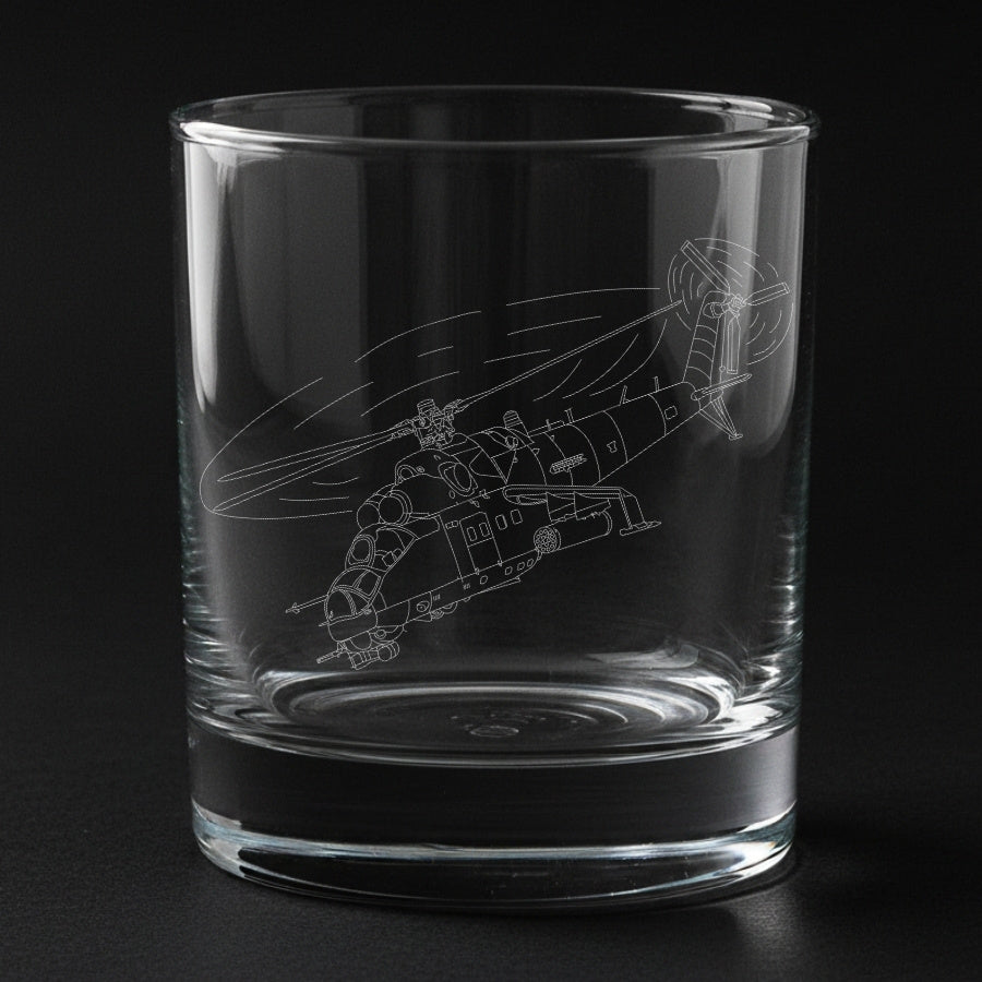 Clear glass tumbler with mi-35 helicopter etching on a black background