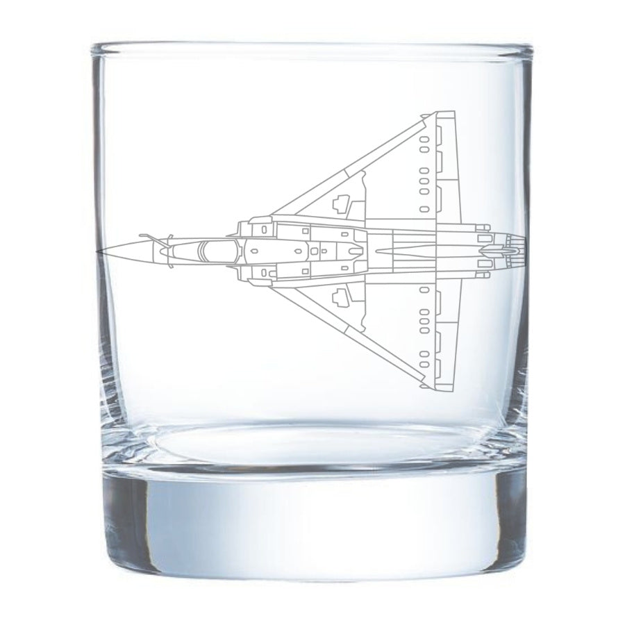 Clear glass tumbler with a mirage 2000 airplane etching on a white background
