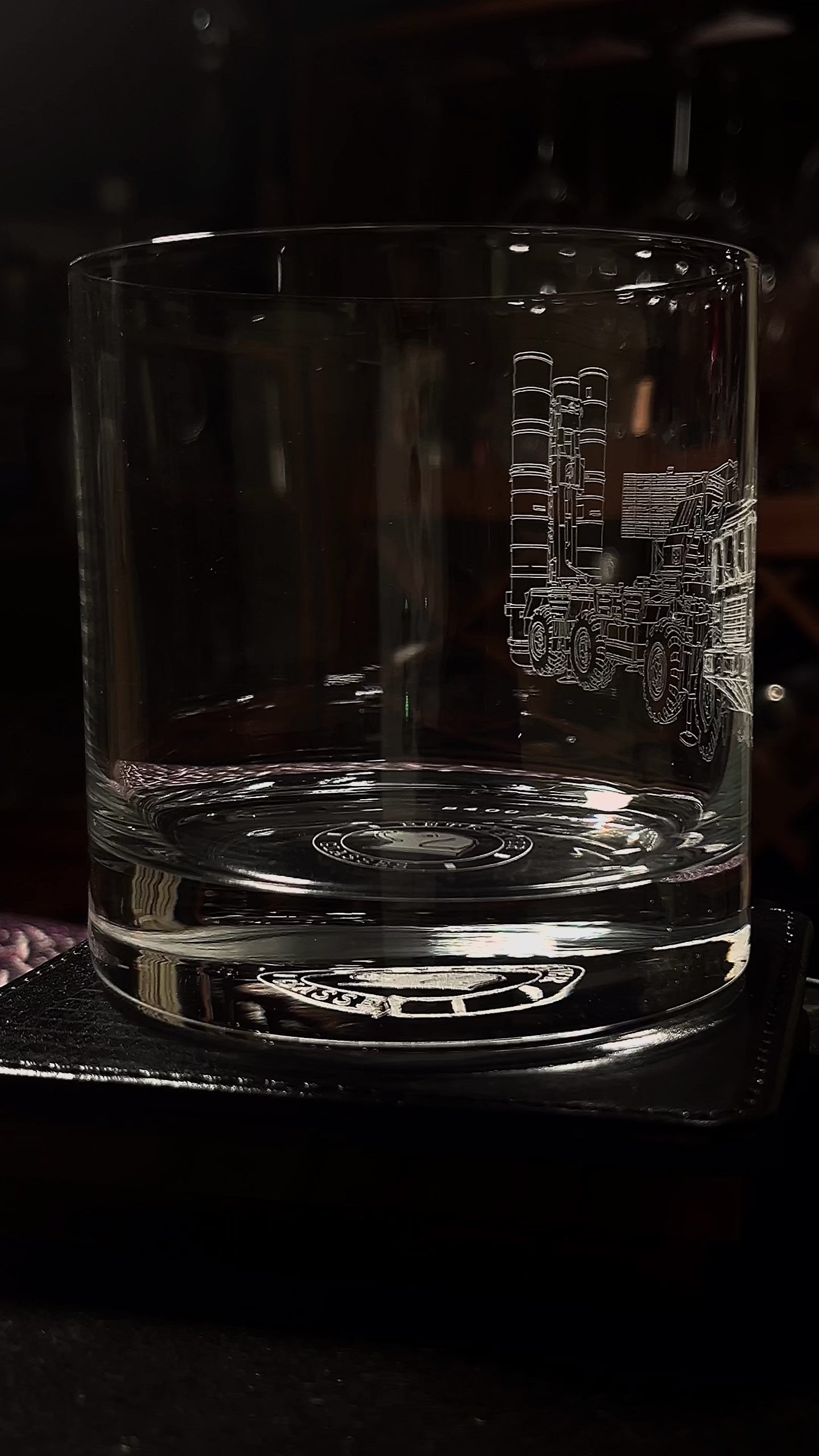 whiskey glass featuring a s400 launcher on a rotating table