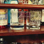 empty engraved glasses with Sukhoi su-30 and Rafale on the bar