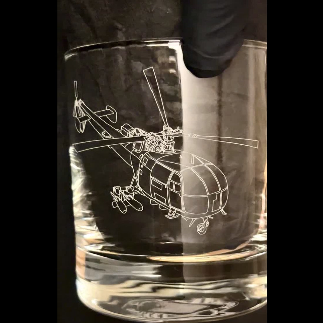 glass with etch of chetak helicopter