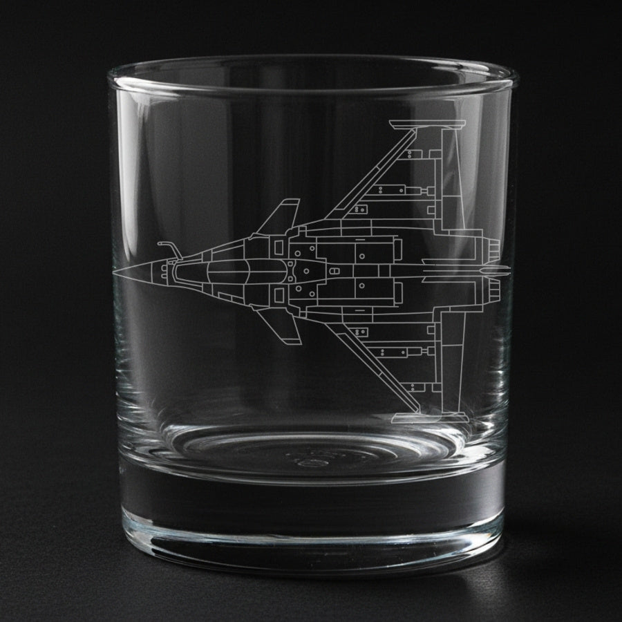 The Rafale aircraft engraved on a glass with a black background