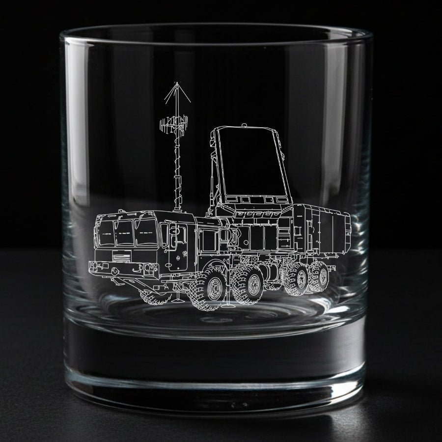 Clear glass tumbler with a detailed laser engraving of a s400 truck and 92n6a radar system on a black background