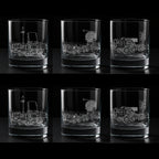 Set of six glass tumblers with engraved s400 air defence system designs on a black background