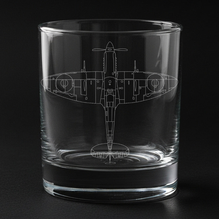 spitfire aircraft engraved on a glass with a black background