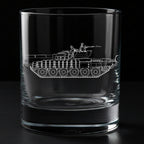 Clear glass tumbler with a side of a t72 tank design etched on it against a black background