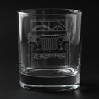 a willys jeep engraved on a glass with a black background